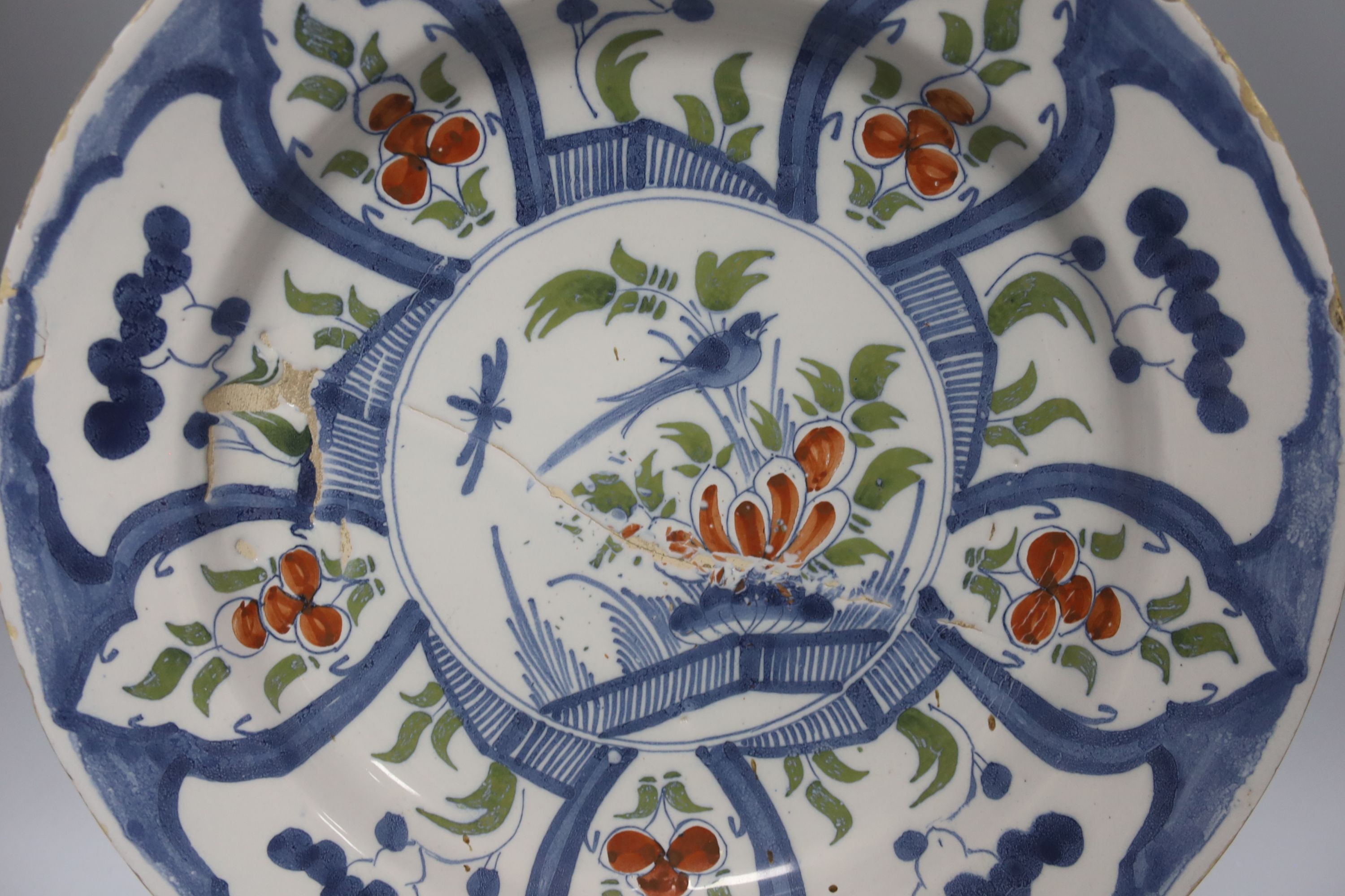 An 18th century Delft polychrome dish 35cm